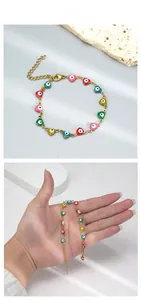 Bracelet œil maléfique en forme de cœur doré avec fermoir mousqueton ajustable