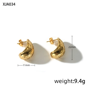 Detailed view of golden irregular pea earrings with 11mm width and 22mm height specs