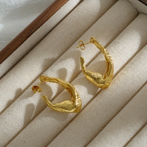Irregular twisted 18K gold earrings with lava texture for women in retro style