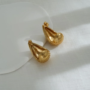 Polished gold striped teardrop stud earrings for women with vintage metal finish