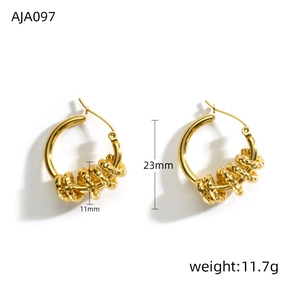 Detailed view of golden irregular hoop earrings with twisted knot texture and 23mm diameter