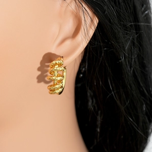 Chunky gold irregular twisted hoop earrings with textured finish for women