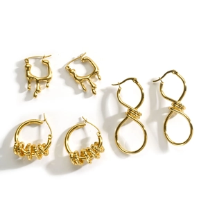 Three-pair gold stainless steel earrings set with twisted, irregular, and multi-ring designs