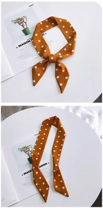 Detail of ginger yellow polka dot silk scarf for handbags and hair styling