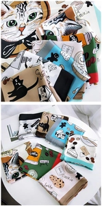 Detail of silk square scarf featuring hand-drawn cat and coffee cartoon illustrations