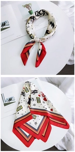 Detail of silk-like square scarf with cartoon animal prints and colorful striped edges