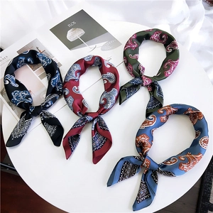 Set of four elegant paisley printed square silk scarves in green, red, navy, and blue