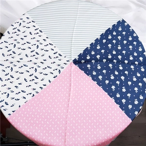 Round floral and striped pattern square silk scarf shown in flat lay perspective