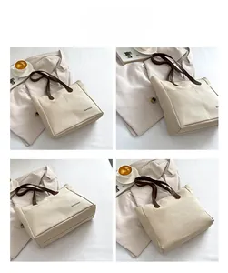 Detail shots of off-white canvas tote bag with brown leather handles and brand logo