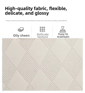 Macro detail of high-quality white quilted leather fabric with a glossy finish