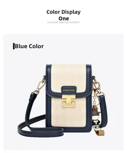Detail view of quilted blue and white crossbody bag with gold buckle and cow charm