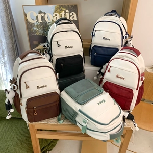 Sacs à dos en toile grande capacité en cinq couleurs avec pendentifs pour l'école