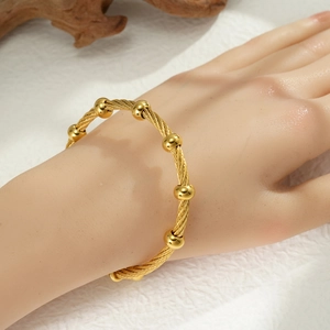 Bracciale rigido in acciaio inossidabile placcato oro 18k a treccia con sfere metalliche