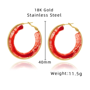 Detailed view of 40mm 18K gold plated stainless steel hoop earrings with red resin inlay