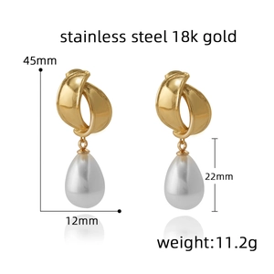 Detail view of water drop pearl earrings featuring 18k gold plated stainless steel hooks