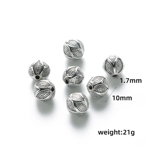 Dettaglio di perline in metallo retrò da 10mm con incisione floreale per gioielli DIY