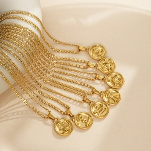 Golden Figaro chain necklaces with embossed 12 zodiac coin pendants in a vintage style