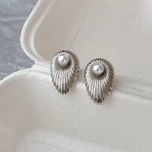 Vintage silver shell stud earrings with white pearl detail for women in minimalist style