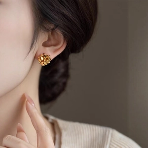 Golden sequin spherical stud earrings featuring a floral cluster design for women
