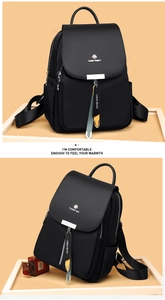 Détail d'un sac à dos en nylon imperméable avec logo en métal et bretelles réglables