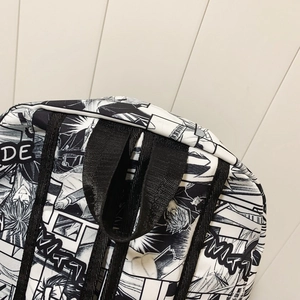 Fashionable street style backpack with black and white manga print and nylon handles