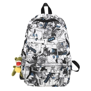 Black and white manga print backpack with green dinosaur plush accessory for students