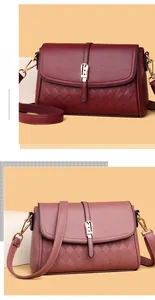 Detail view of lychee texture and diamond lattice leather bags in burgundy and pink