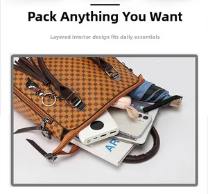 Detailed internal view showing large storage capacity and interior pockets of the tote bag