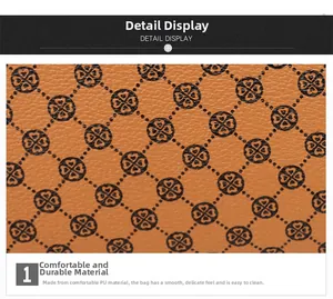 Detail view of orange-brown PU leather with black clover print and lychee texture