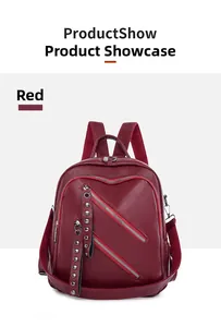 Detail view of wine red PU leather backpack featuring decorative zippers and silver rivets