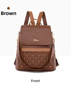Close-up of brown PU leather backpack featuring diamond quilting and gold stud accents