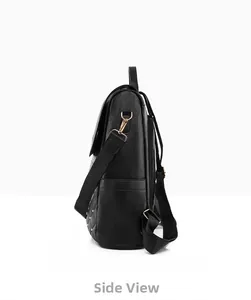 Side view of black faux leather backpack featuring quilted pattern and golden rivets