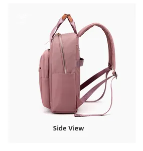 Side view of pink waterproof nylon backpack with zipper pockets and shoulder straps
