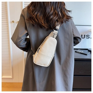 Detail of cream PU leather crossbody bag with vintage geometric jacquard wide strap