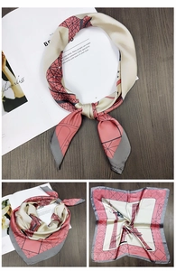 Detail of silk scarf featuring Eiffel Tower design in champagne, pink, and grey colors