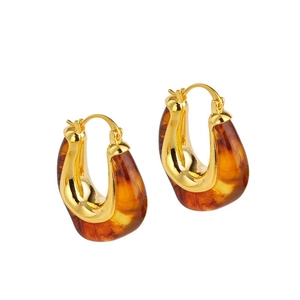 Vintage gold-plated hoop earrings with amber acrylic resin in a chunky teardrop shape