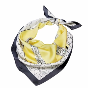 Modern geometric silk square scarf in yellow and grey with a sleek metallic sheen
