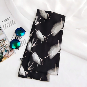 Long silk-like scarf featuring ballet dancer print on elegant white textured background