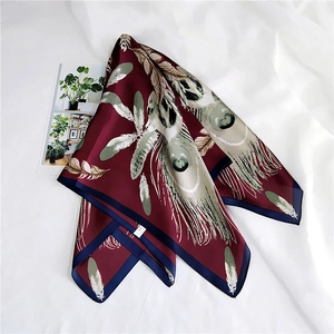 Elegant wine red silk scarf with peacock feather pattern and navy blue borders