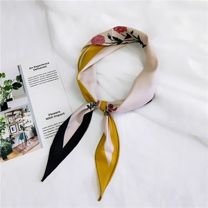 Floral silk square scarf with carnation print and color block design on white fabric