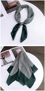 Detailed view of square silk scarf with dark green and white diagonal stripe patterns