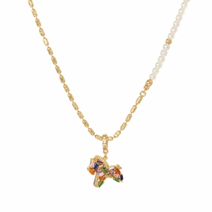 Asymmetric gold chain necklace with white pearls and a colorful horse pendant