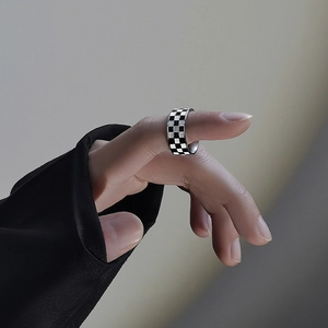Classic 18K gold plated checkerboard titanium steel ring on hand for street style look