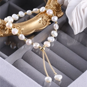 Elegante pulsera de perlas barrocas de agua dulce con cierre ajustable de acero de titanio