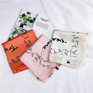 Detailed set of satin silk square scarves featuring Eiffel Tower print in three colors