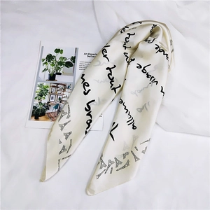 Elegant French style square silk scarf with black cursive letters and Eiffel Tower print