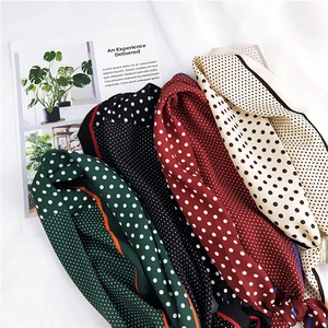 Polka dot silk neck scarf set in dark green, black, red, and beige with contrast piping