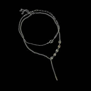 Double-layered silver titanium steel necklace featuring coffee bean links and Y-shape pendant