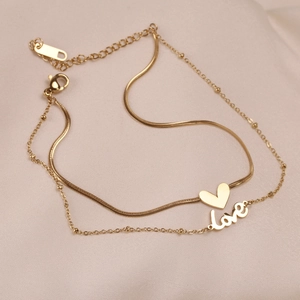 Double-layered stainless steel heart and love charm anklet in gold finish with snake chain