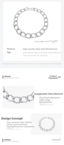 Détails macro d'un collier chaîne cubaine argentée orné de strass de 2cm de large